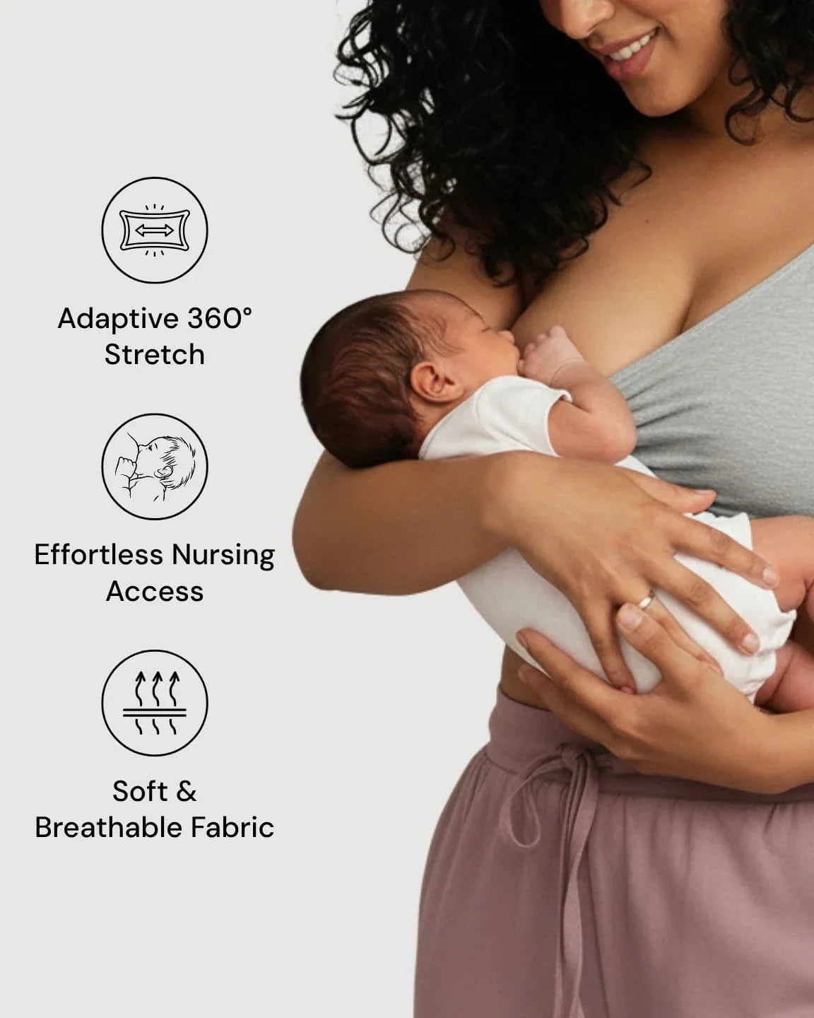 Woman in a gray cotton wire-free nursing bra breastfeeding her baby, highlighting soft, breathable fabric and easy access.