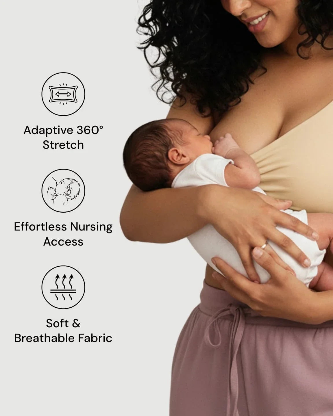 Woman in a beige wire-free nursing bra breastfeeding a baby, highlighting soft cotton and easy access.