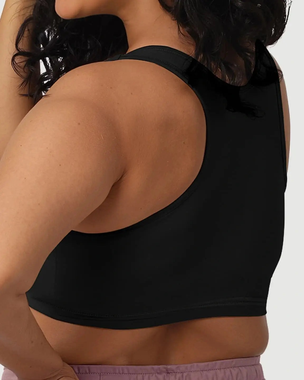 Black soft cotton wire-free nursing bra with wide straps, shown on a model from the back and side.