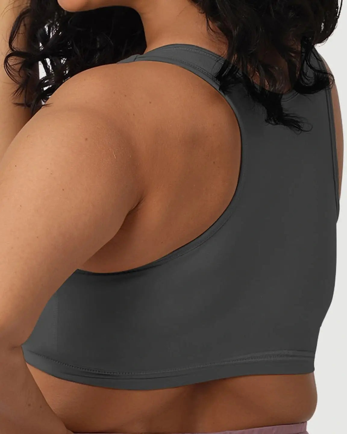 Dark gray soft cotton wire-free nursing bra with a racerback design, shown on a model's back.