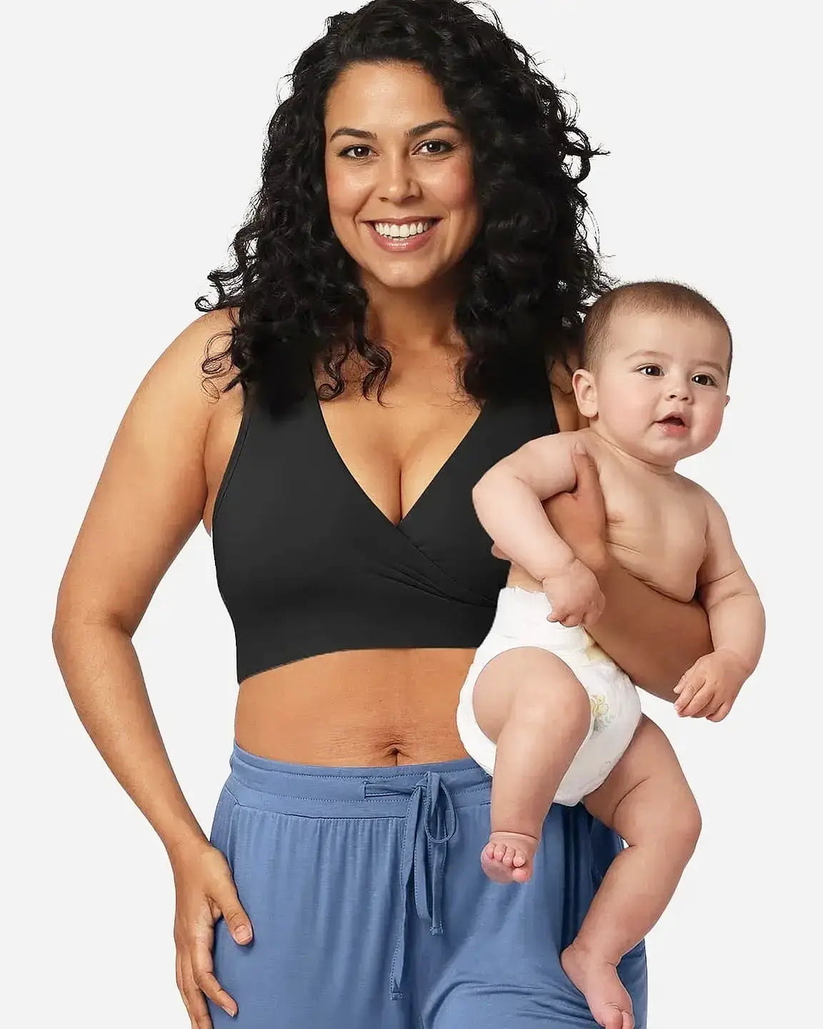 Smiling woman in a black soft cotton wire-free nursing bra holding a baby.