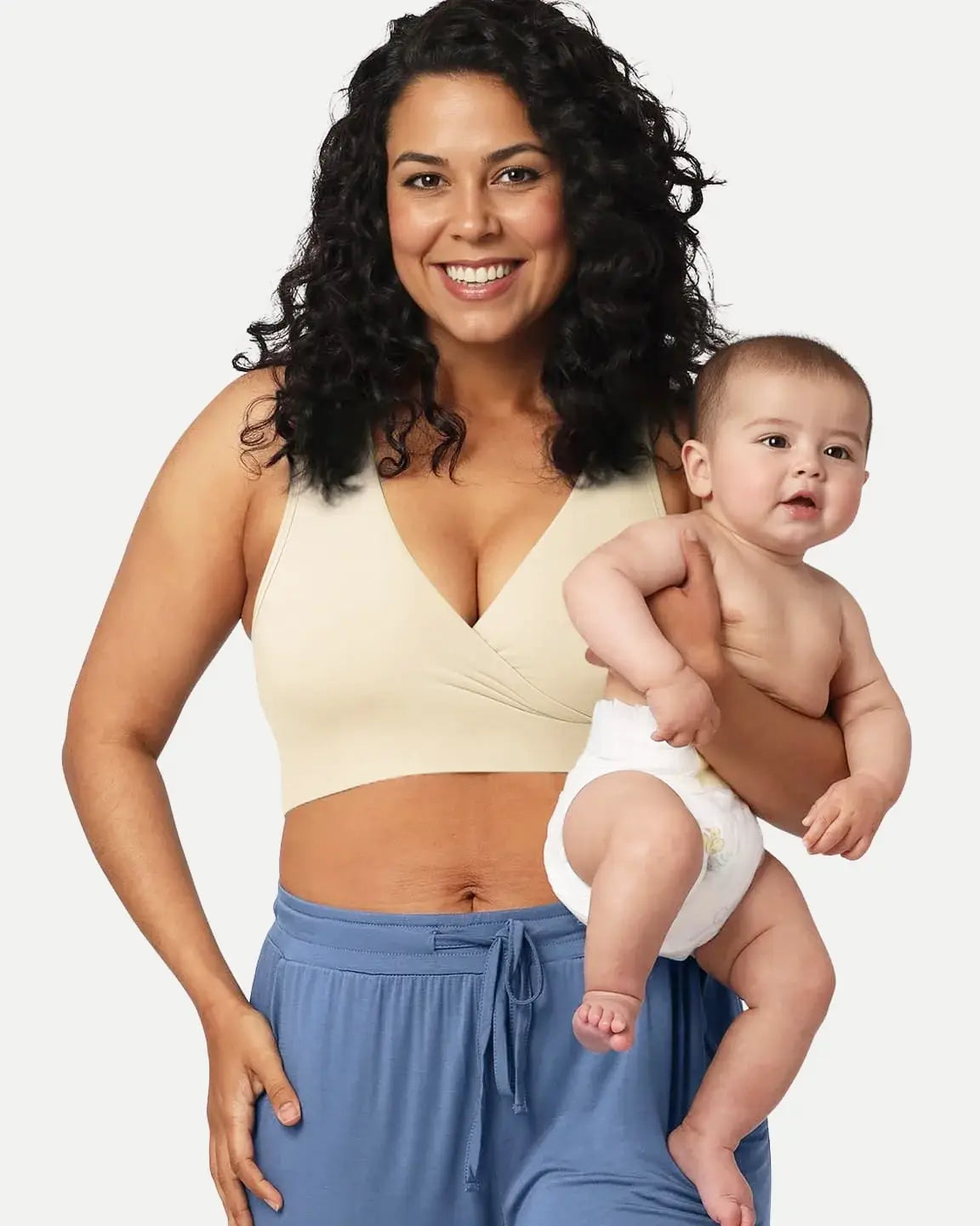 Smiling mother in a cream soft cotton wire-free nursing bra holding her baby.