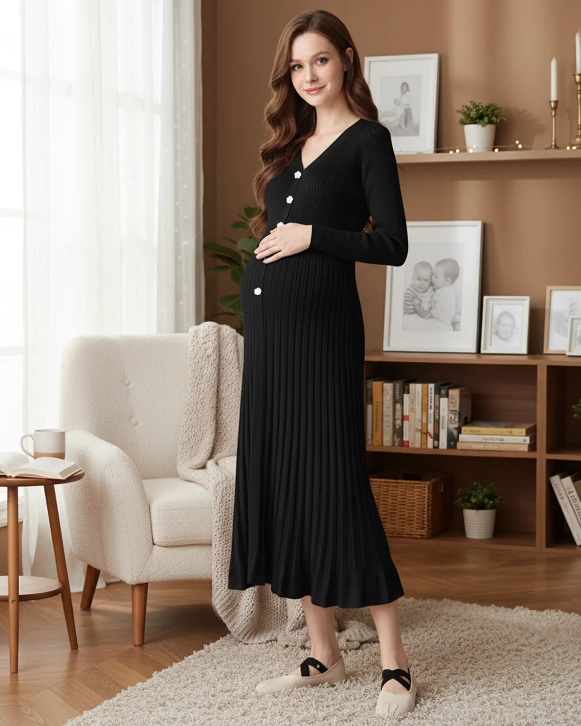 Pregnant woman in a black ribbed knit maternity midi dress with long sleeves, V-neck, and white buttons.