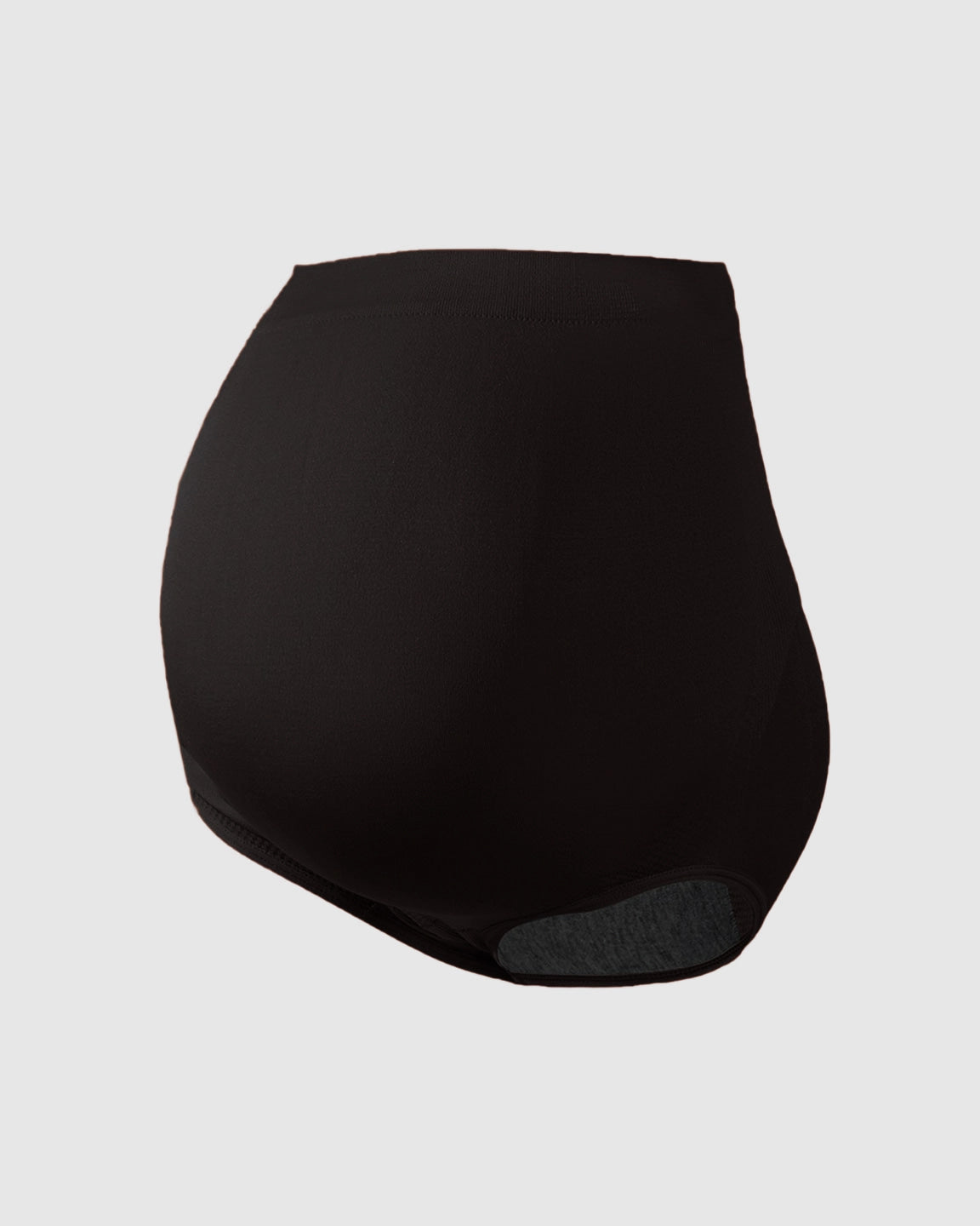 Black seamless high-waist maternity panties from The Comfort Collection, designed for bump support.
