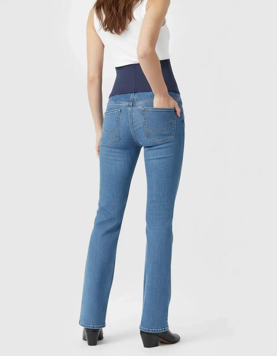 Classic high-waist flared-leg maternity jeans in light blue stretch denim with a navy over-belly panel.