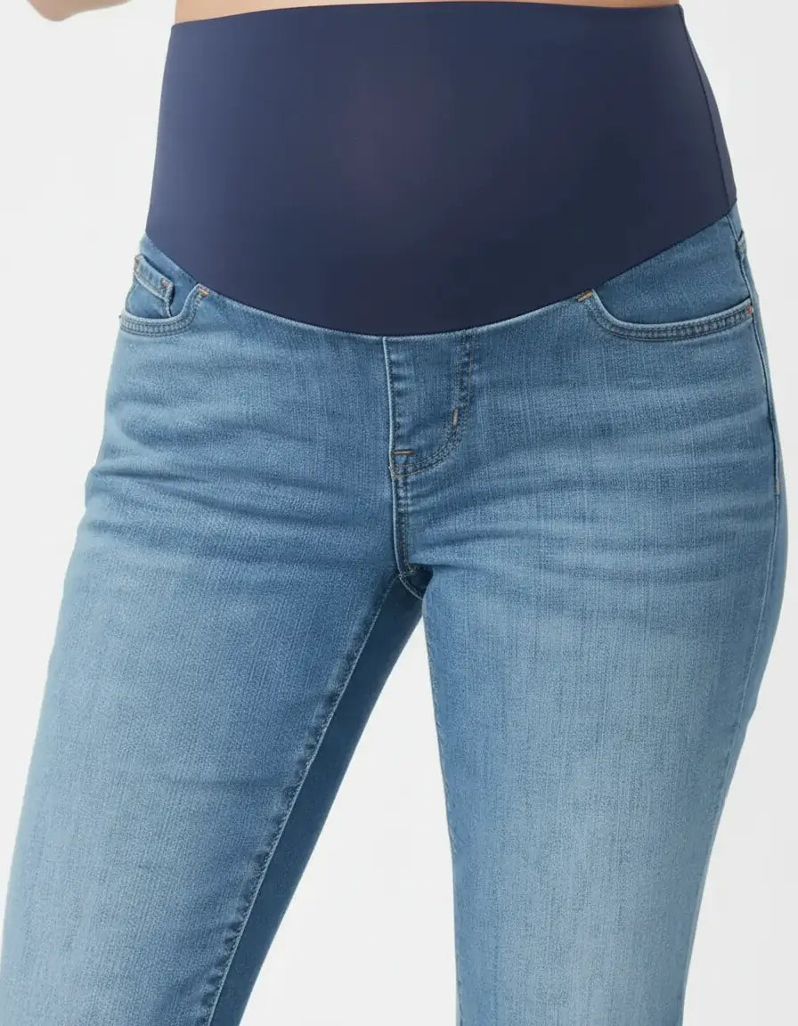 Light wash classic high-waist flared-leg maternity jeans with a navy over-belly panel.