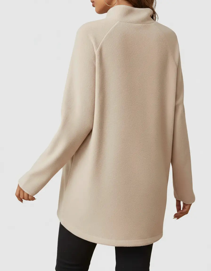 Beige soft knit half-zip long sleeve maternity top with a stand collar and relaxed fit.