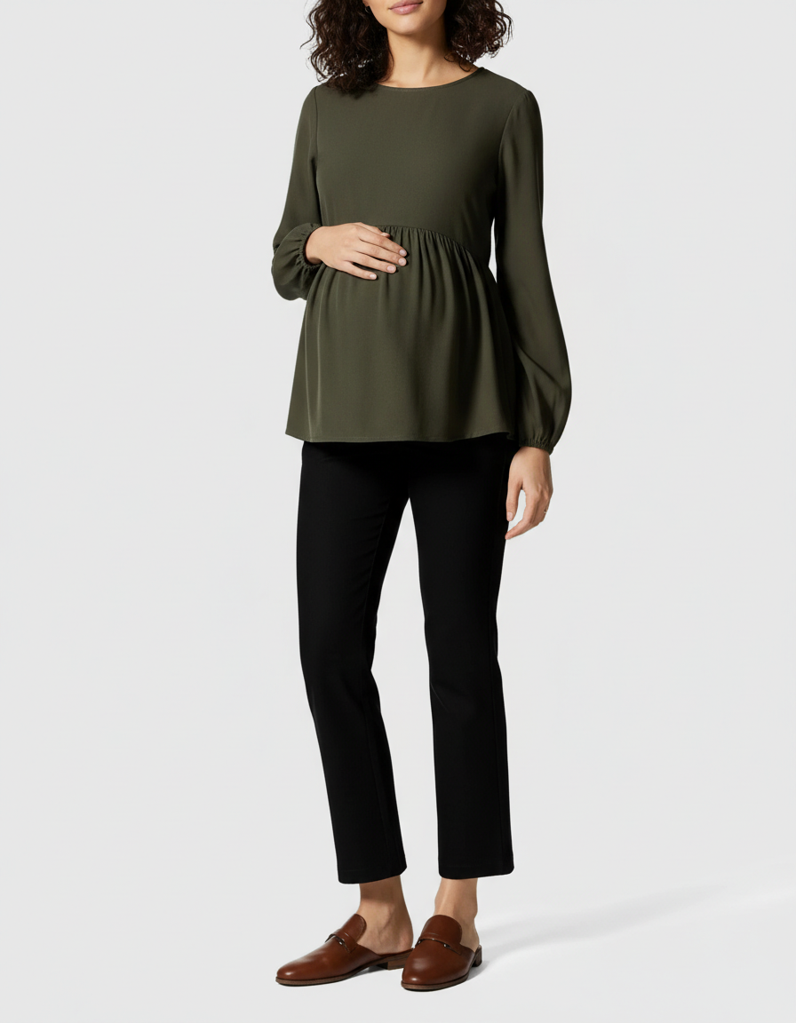 Woman in olive green long-sleeve maternity top and black high-waist kick flare maternity pants.