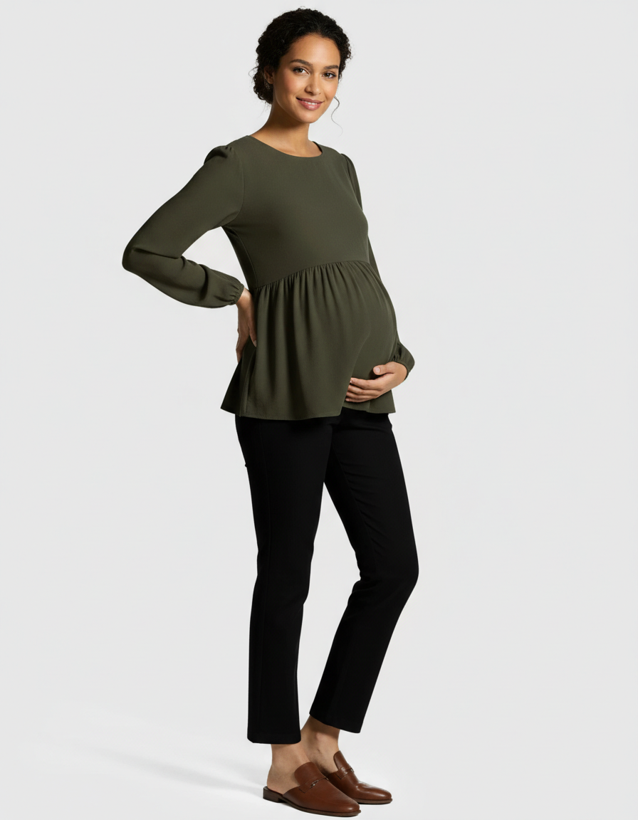 Pregnant woman in olive green peplum maternity top and black high-waist kick flare pants.