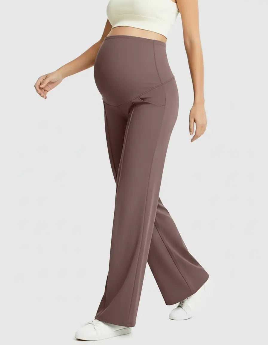 Brown high-waisted maternity pants with a relaxed, wide-leg fit, worn by a pregnant woman.