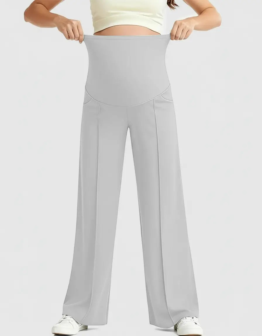 Light gray high-waist maternity pants with a relaxed, wide-leg fit and comfortable over-the-bump panel.