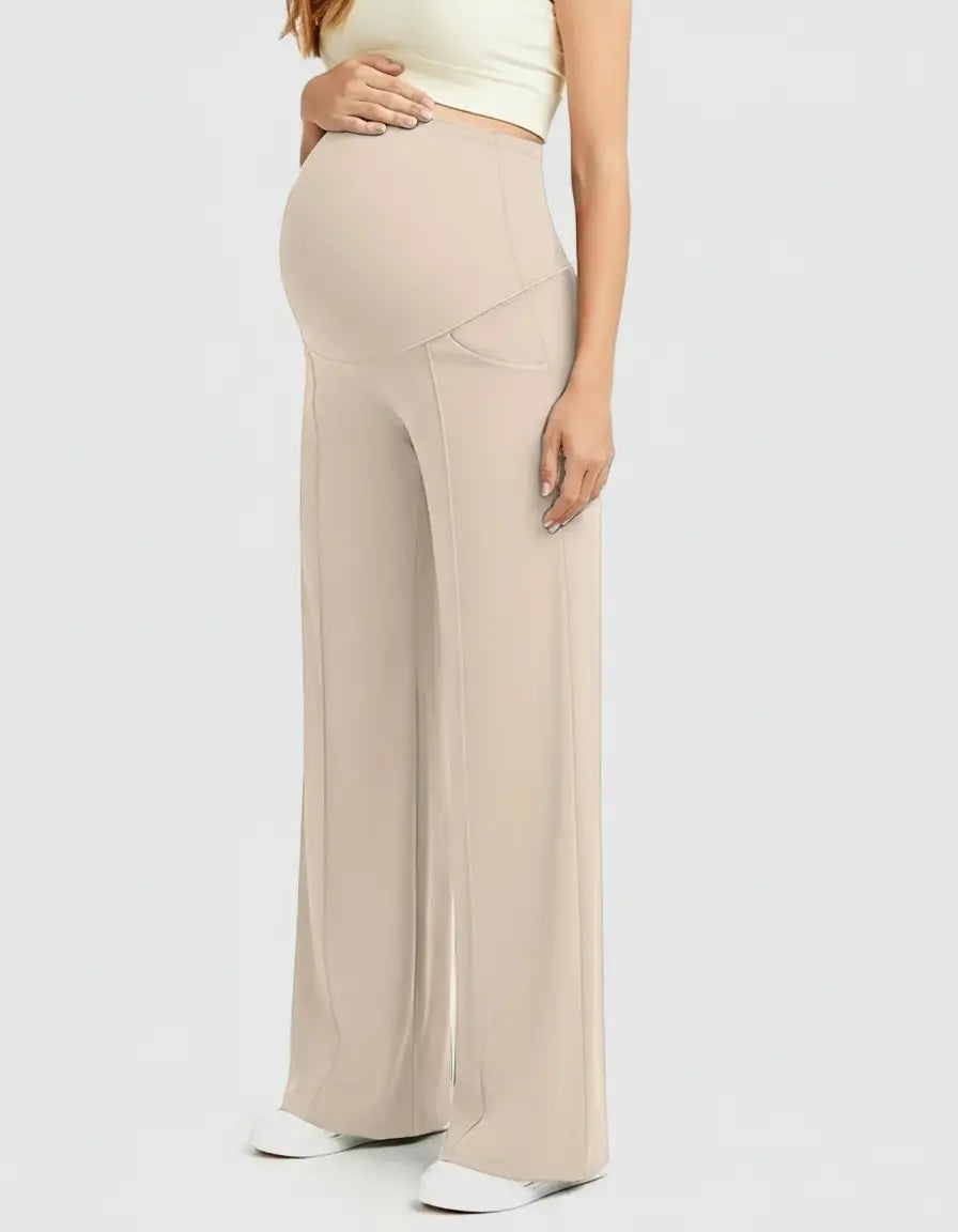 Beige high-waist maternity pants with a relaxed, wide-leg fit and comfortable belly panel.