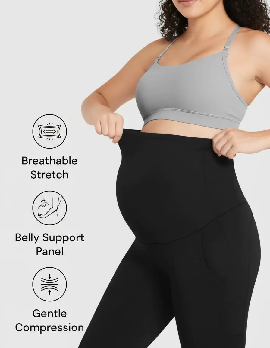 Pregnant woman in black high-waist flare-leg maternity leggings with belly support panel.