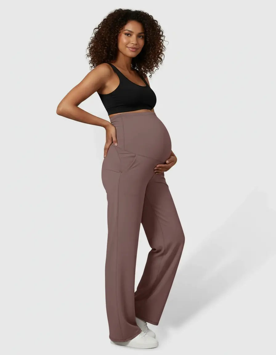 Pregnant woman in high-waist, straight-leg maternity pants in a soft, breathable mauve fabric.