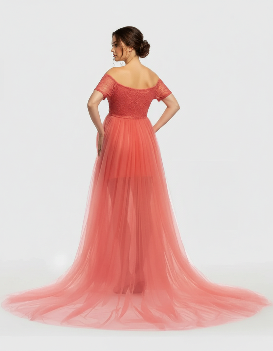 Coral lace and mesh off-shoulder maternity gown with a flowing tulle skirt.