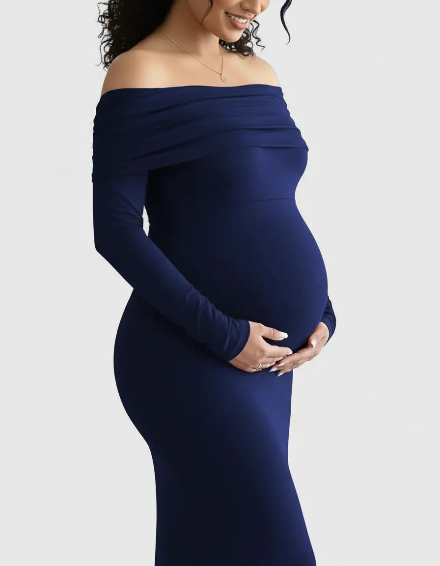 Maternity gown in navy blue, off-shoulder, long-sleeved, with a flattering, comfortable fit.