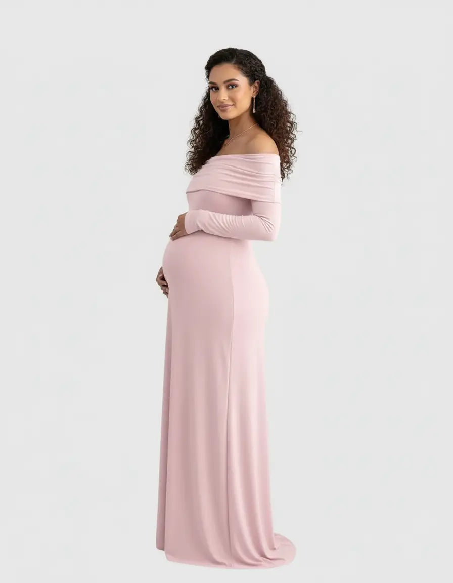 Maternity gown: pink, off-shoulder, cross-back, long-sleeved, floor-length, soft, breathable fabric.
