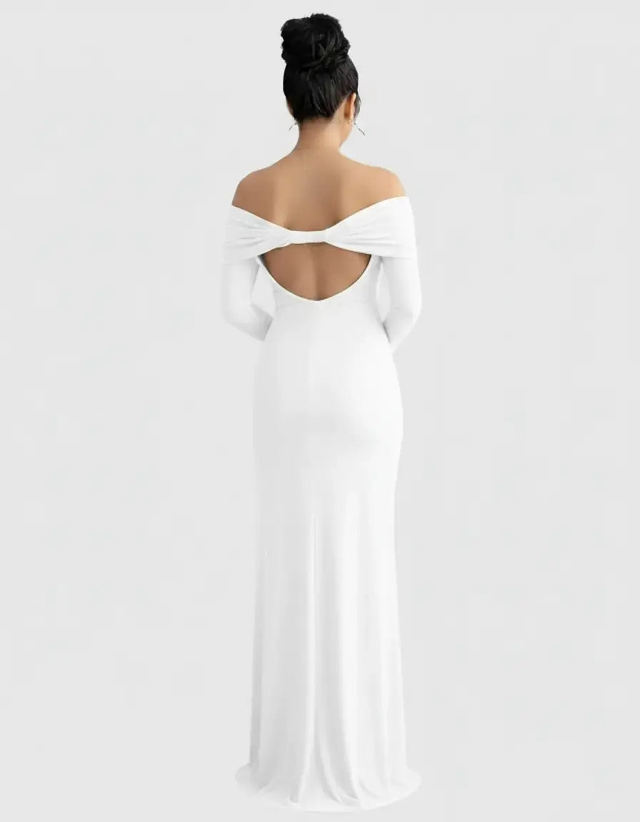 White off-shoulder cross-back maternity gown with long sleeves and a relaxed fit.