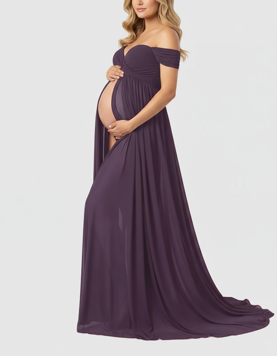 Maternity maxi dress in flowing dark purple chiffon with off-shoulder neckline and draped skirt.