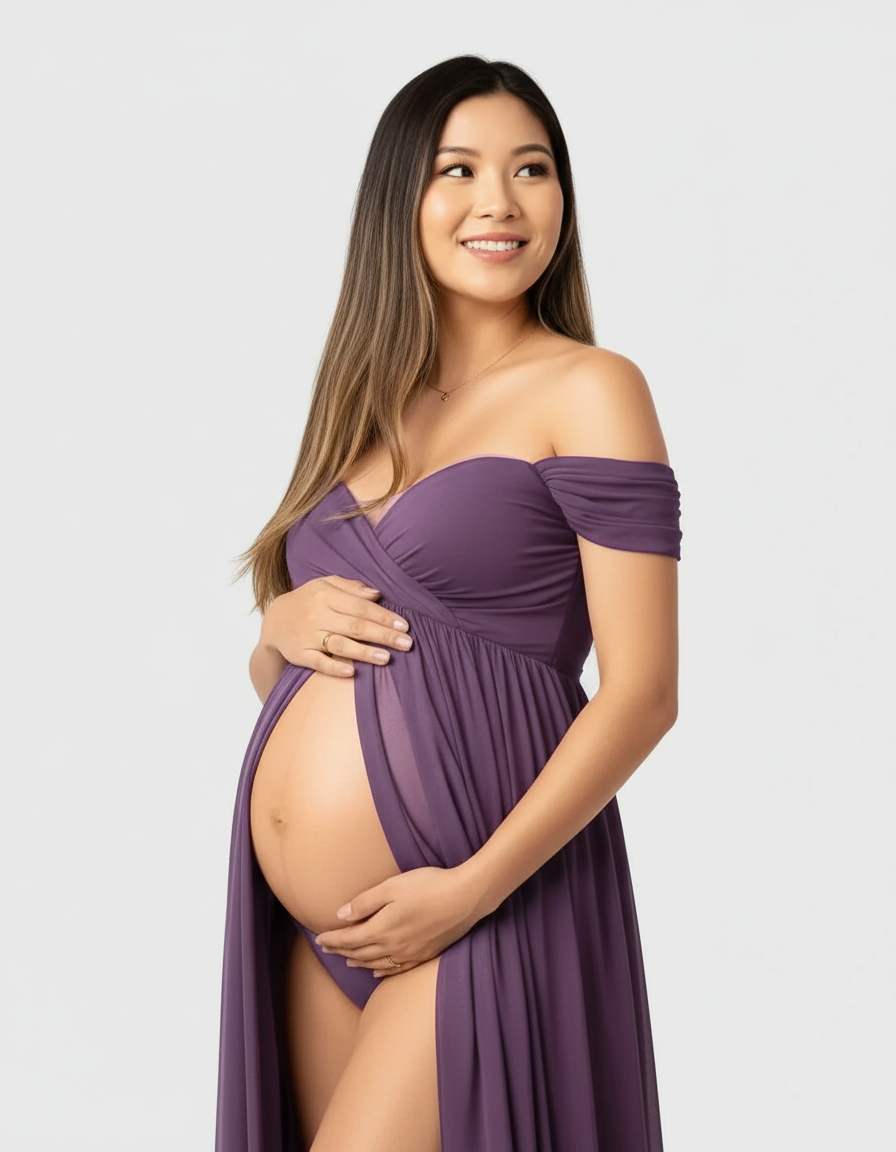 Smiling pregnant woman in a flowing purple off-shoulder maternity maxi dress with a front slit.