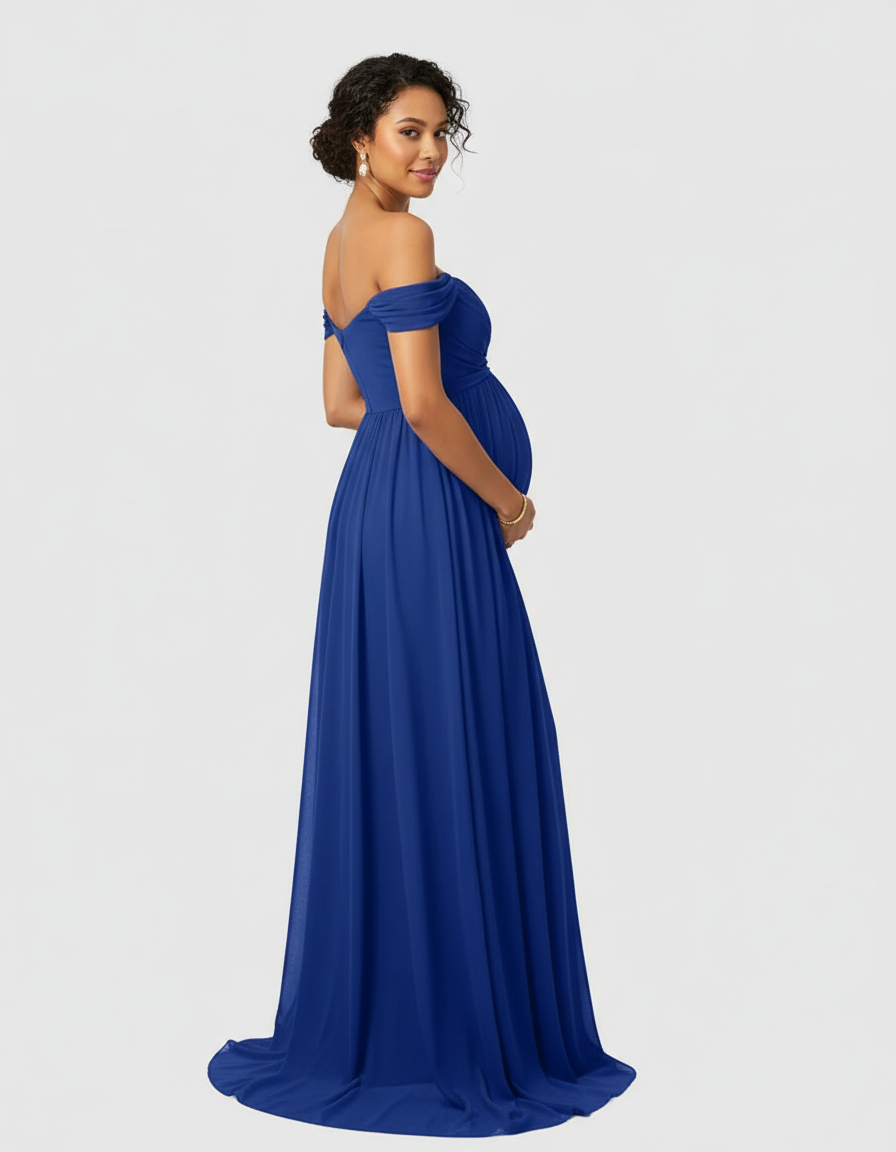Maternity maxi dress in flowing royal blue fabric with an off-shoulder, laced design.