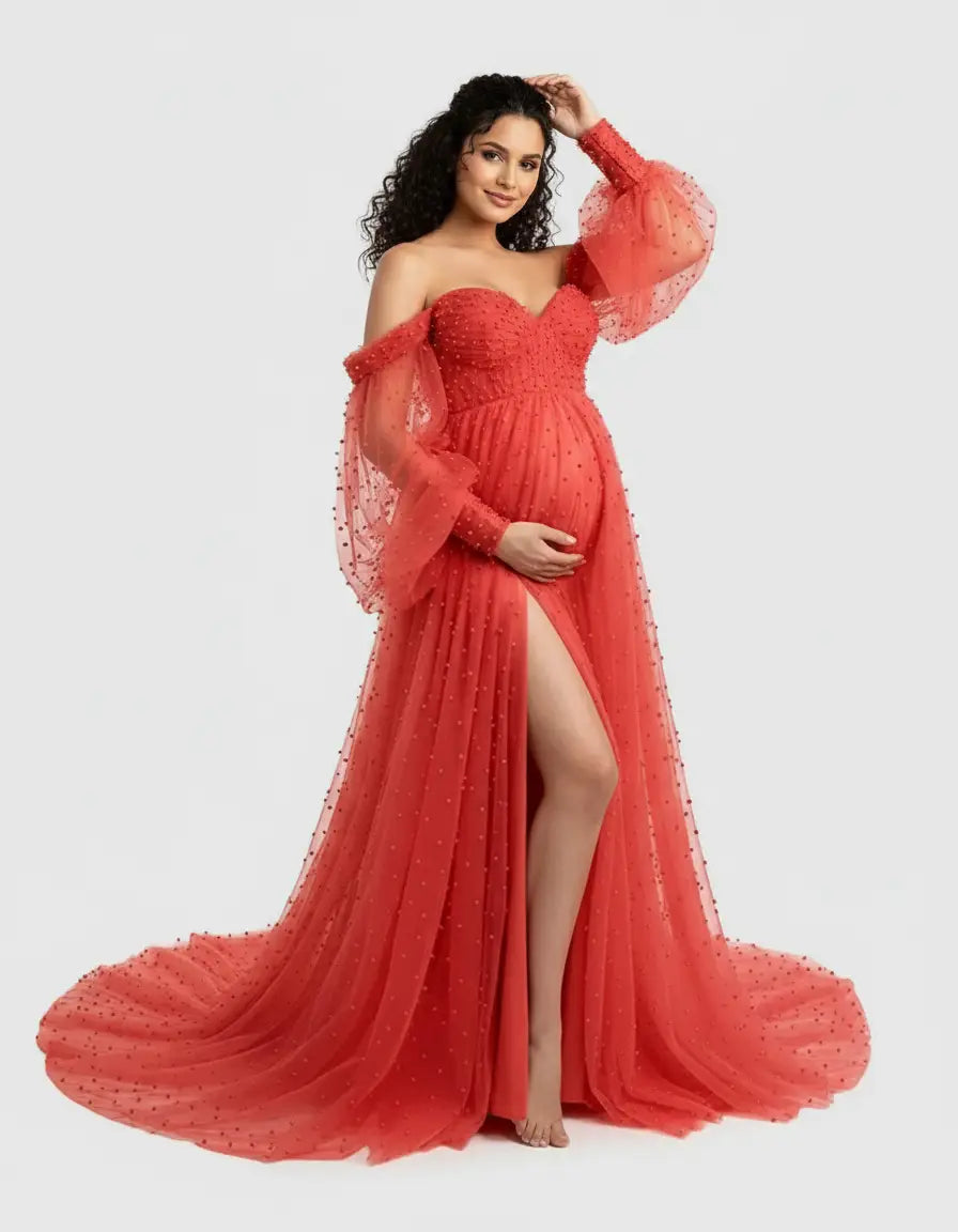 Red off-shoulder tulle train maternity gown with puffed sleeves and a high slit.