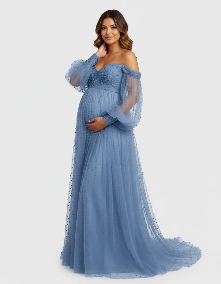 Maternity gown: blue off-shoulder tulle with train, long balloon sleeves, and dotted texture.