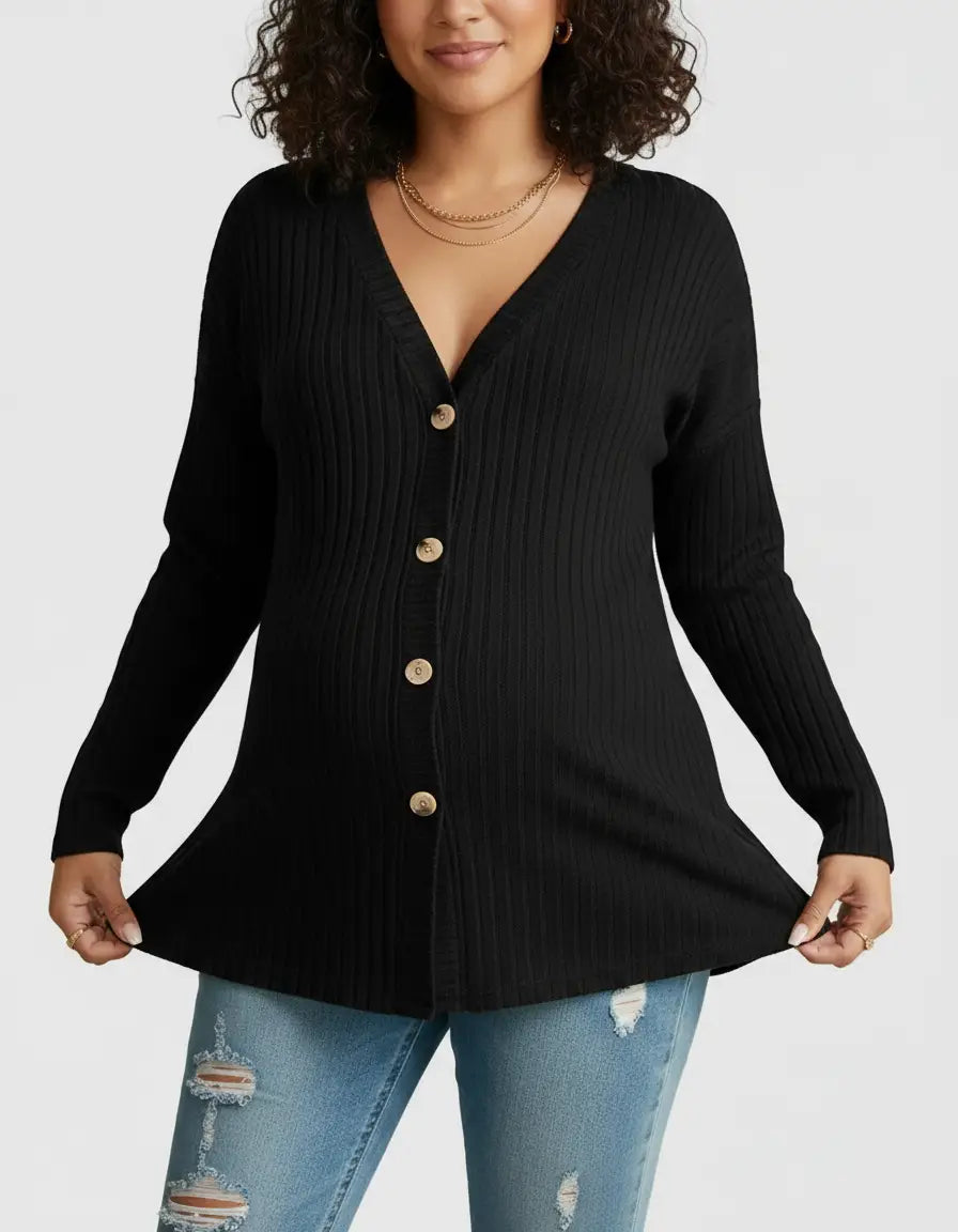 Black ribbed button-front drop shoulder maternity top with wooden buttons, worn by a pregnant woman.