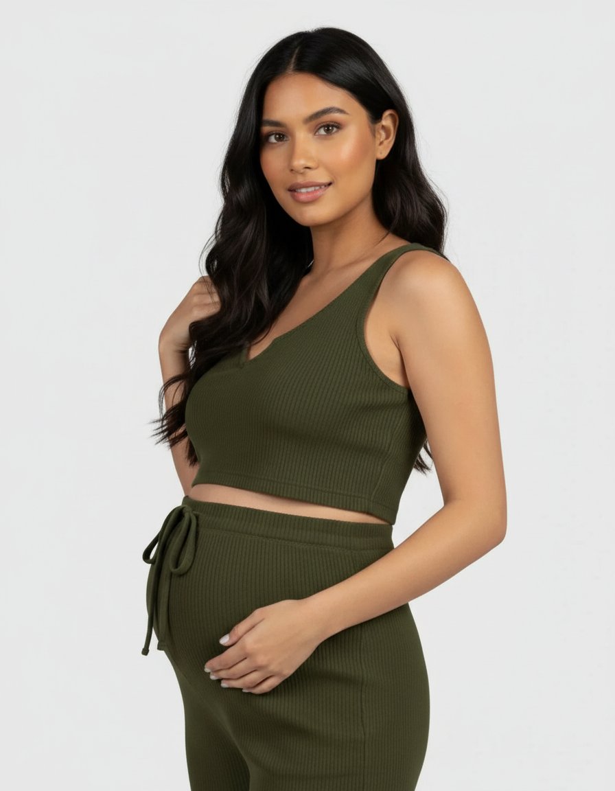 Maternity model in olive ribbed tie-waist camisole and slim-leg pants set.