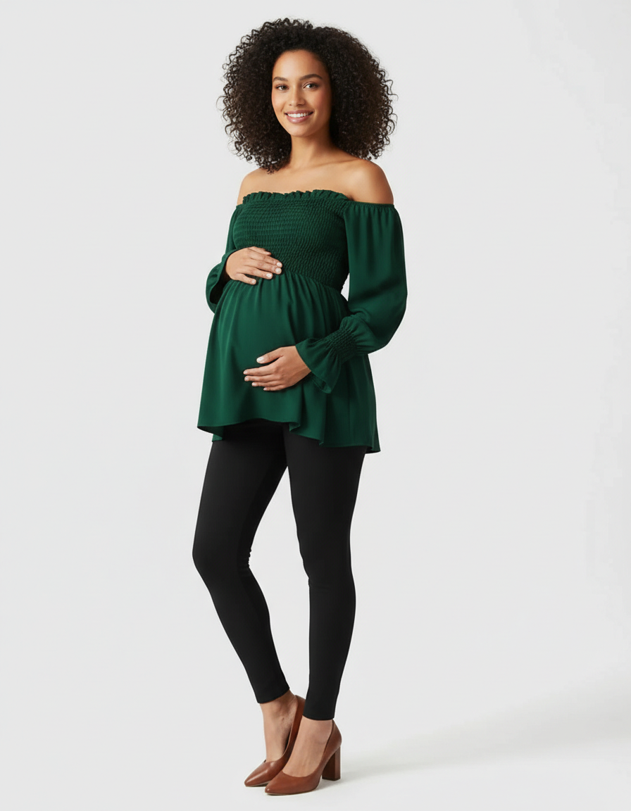Pregnant woman in a dark green ruched off-shoulder maternity top and black leggings.