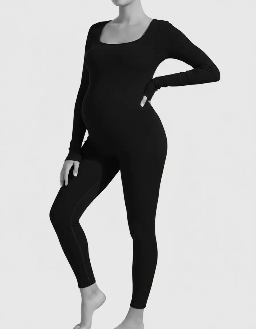 Black seamless ankle-length maternity bodysuit with long sleeves and thumbholes, designed for comfort.