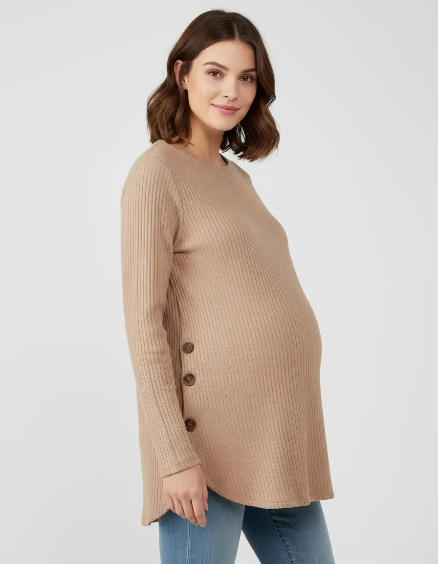 Smiling pregnant woman in a camel soft-knit ribbed maternity sweatshirt with side buttons.