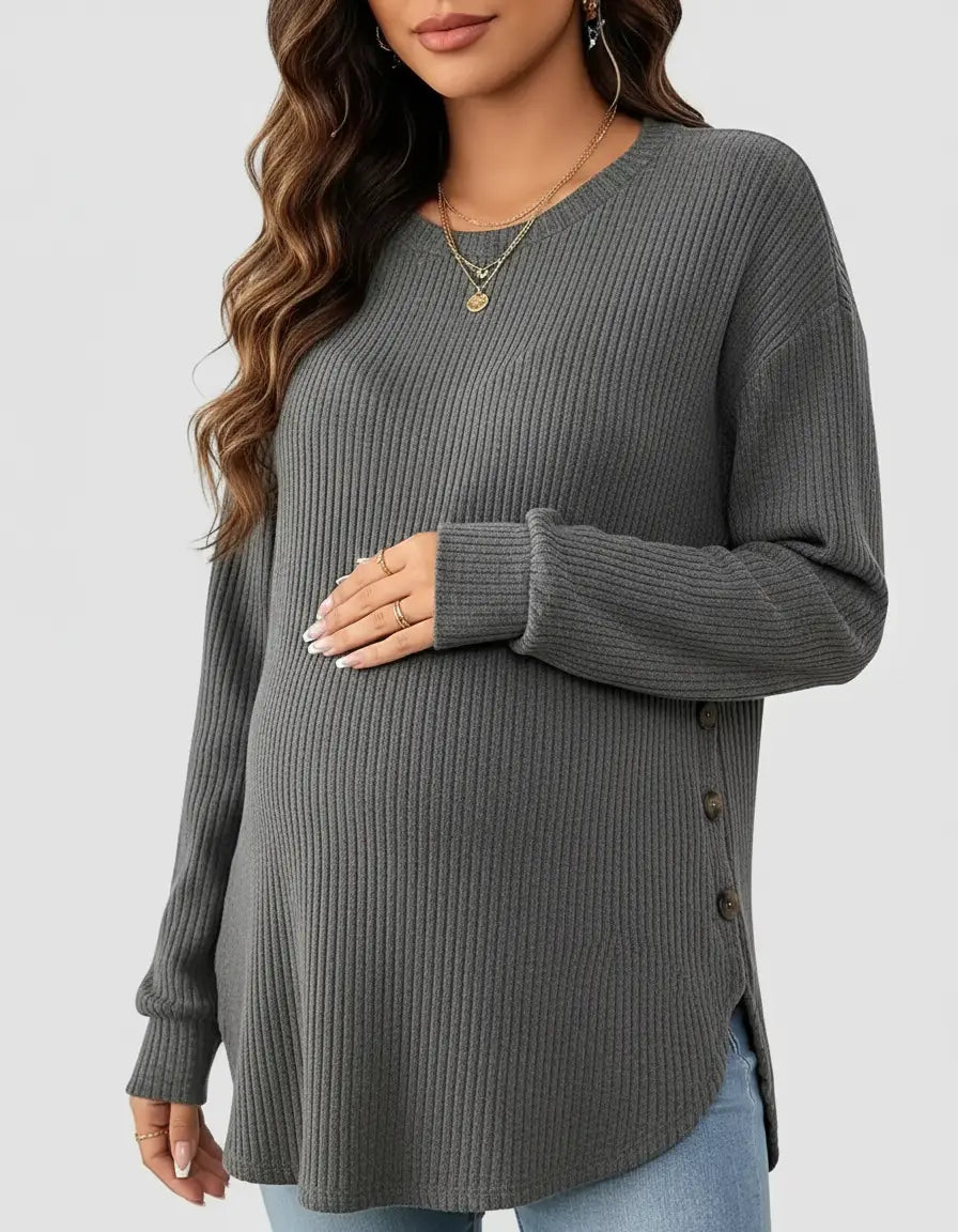 Gray soft-knit relaxed-fit maternity sweatshirt with ribbed texture and side buttons, worn by a pregnant woman.