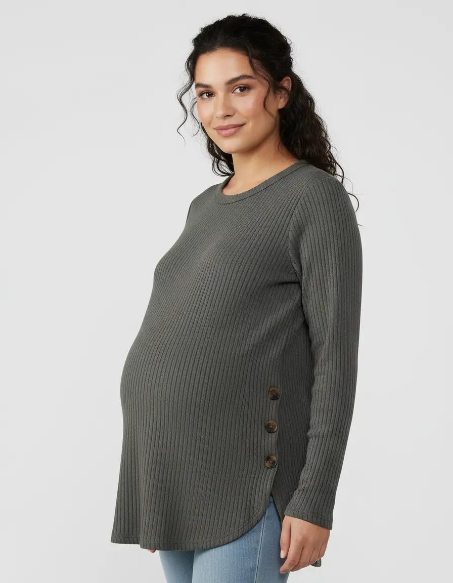 Pregnant woman wearing a dark gray ribbed maternity sweatshirt with side buttons.