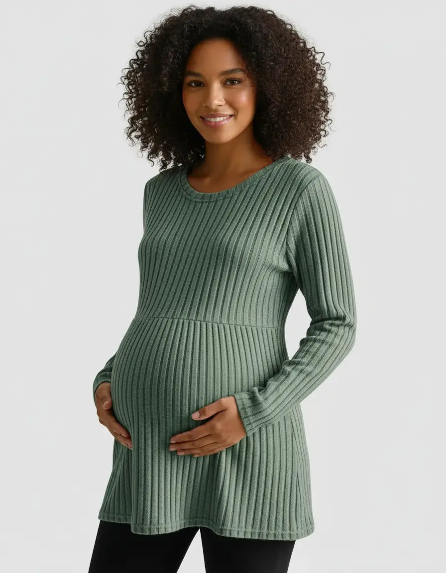Pregnant woman in a sage green stretch-ribbed casual-fit maternity top with long sleeves.