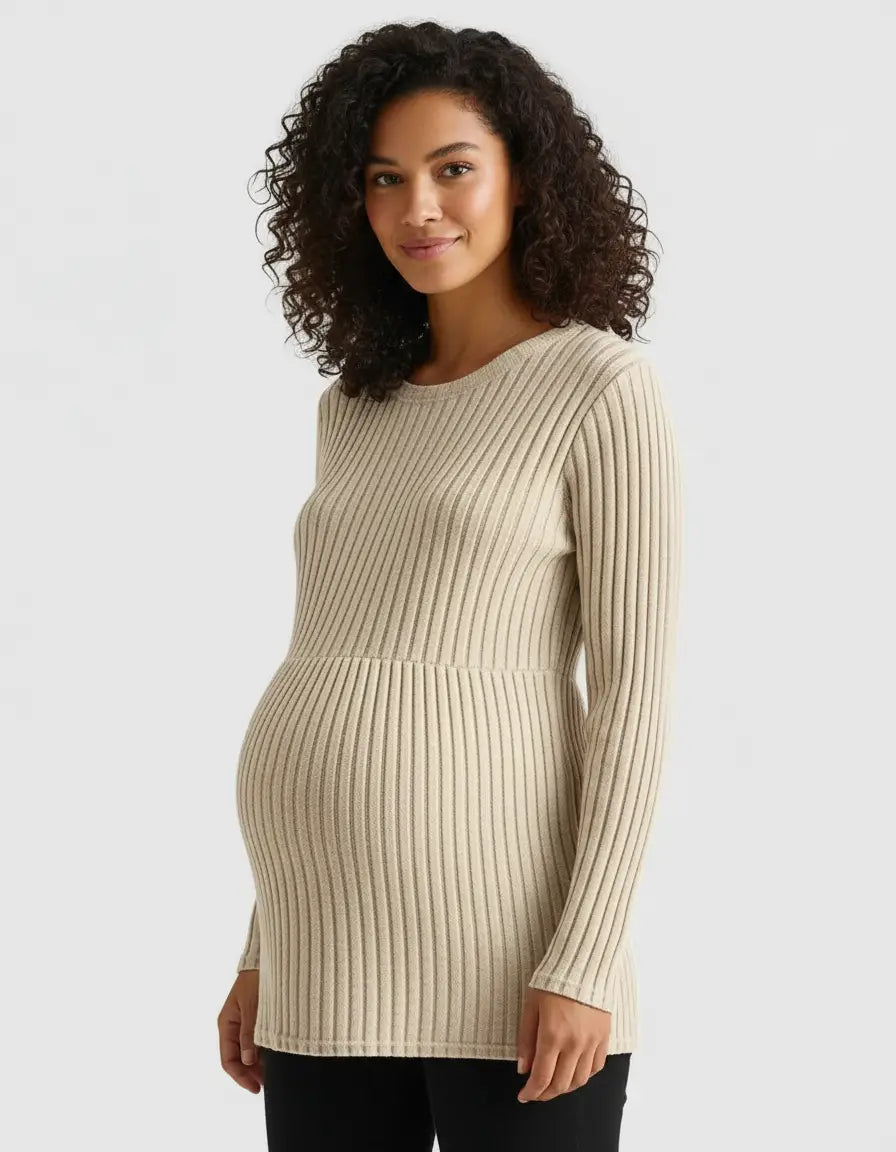Pregnant woman wearing a beige stretch-ribbed casual-fit maternity top with long sleeves.