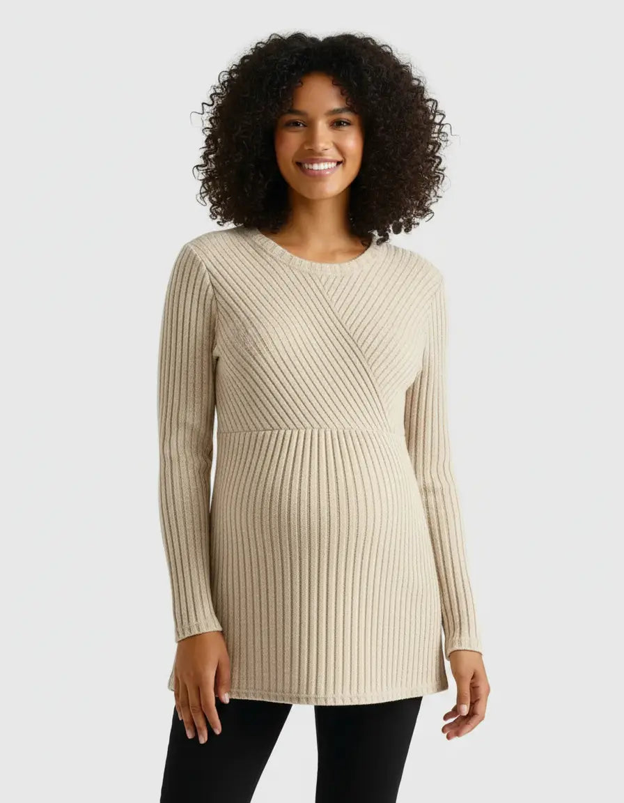 Smiling woman in a beige stretch-ribbed casual-fit maternity top with a crossover design.