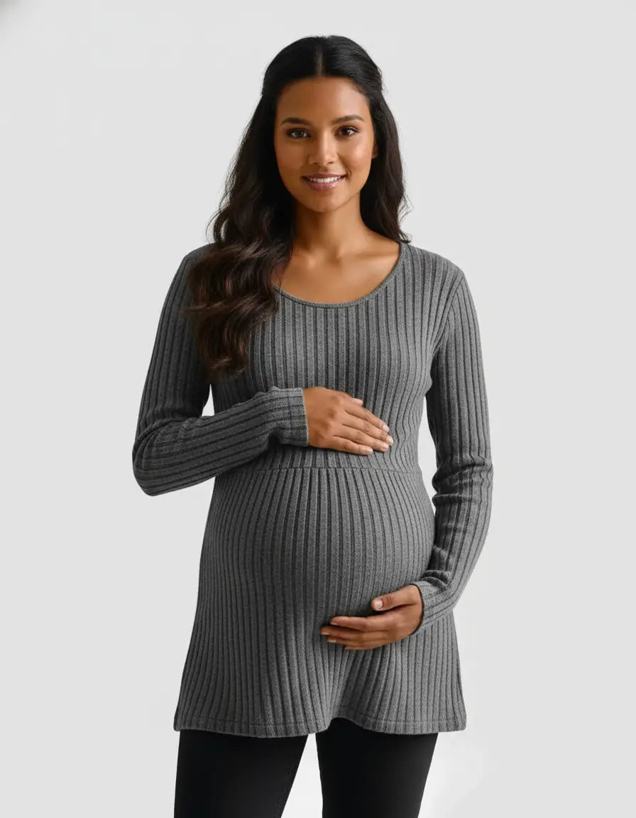Smiling pregnant woman in a gray stretch-ribbed casual-fit maternity top, hands on belly.