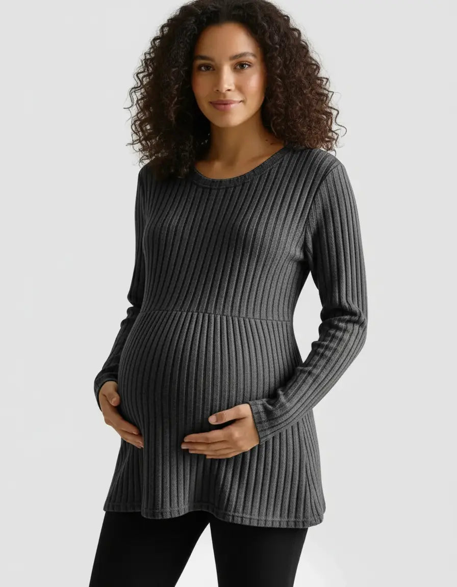 Pregnant woman in a charcoal gray stretch-ribbed long-sleeve maternity top.