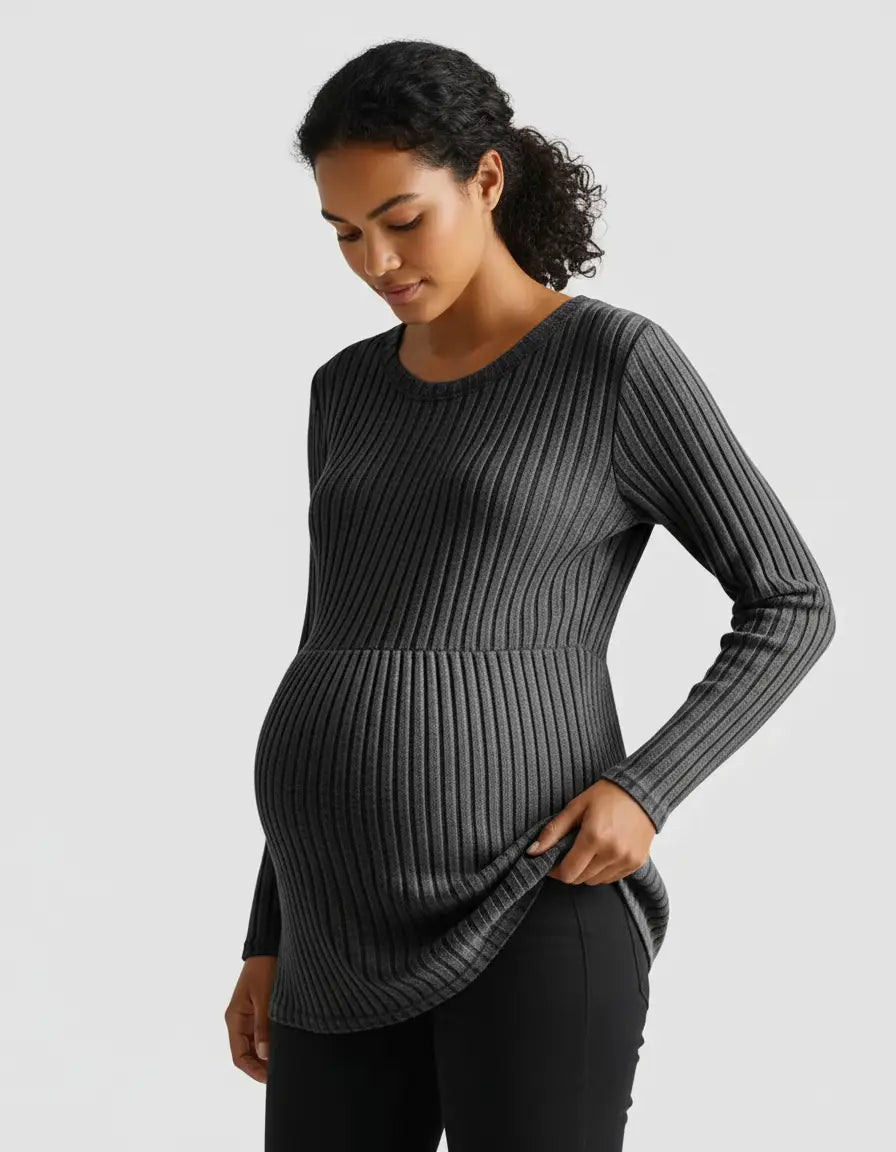 Pregnant woman in a charcoal gray stretch-ribbed casual-fit maternity top with long sleeves.