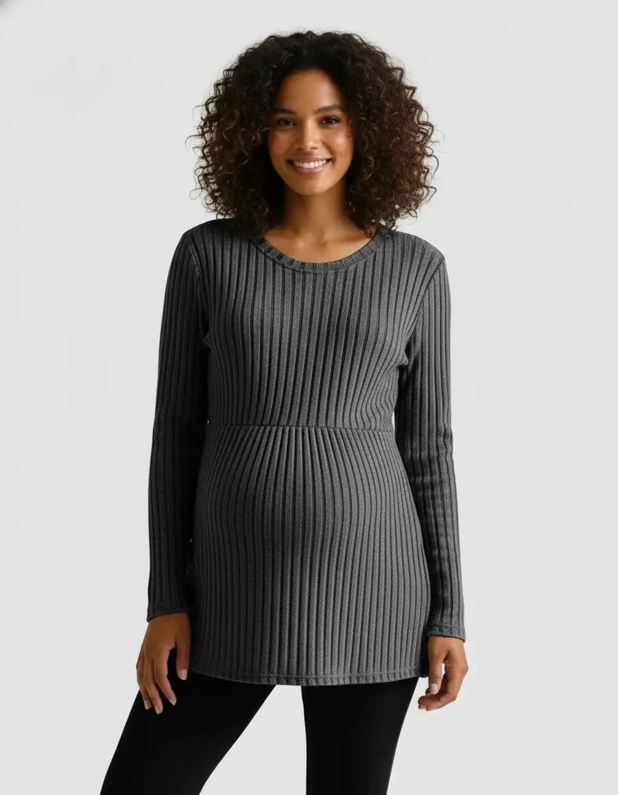 Smiling pregnant woman in a charcoal gray stretch-ribbed long-sleeve maternity top.
