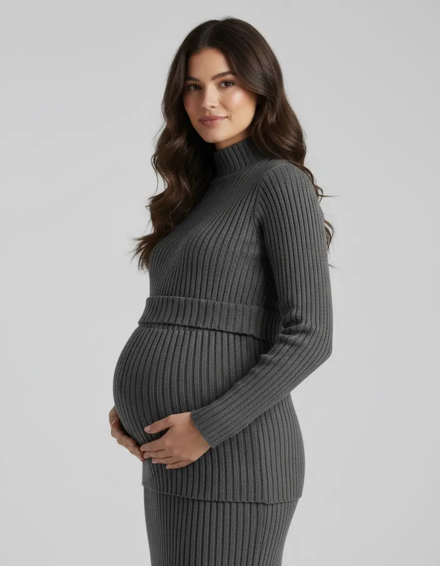 Pregnant woman in a charcoal gray stretch-ribbed casual-fit maternity top with a turtleneck.