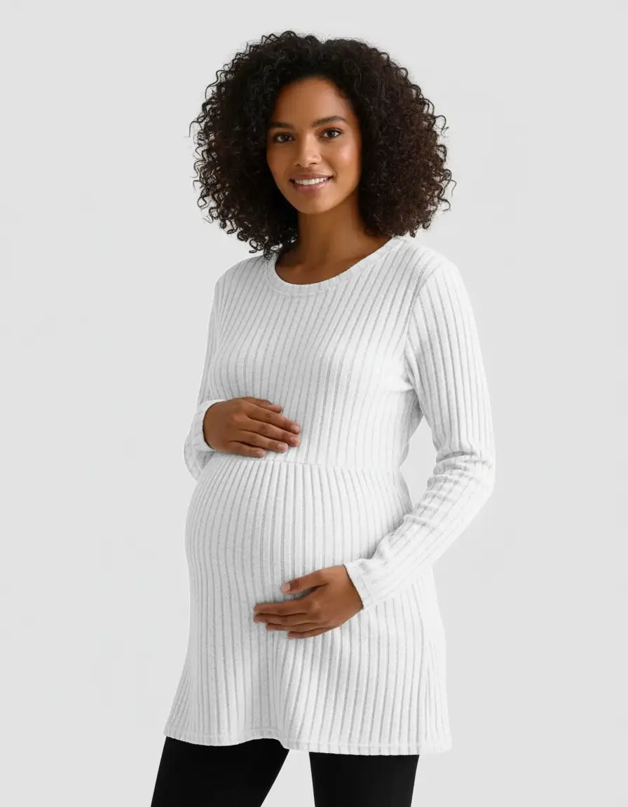 Smiling pregnant woman in a white stretch-ribbed casual-fit maternity top.