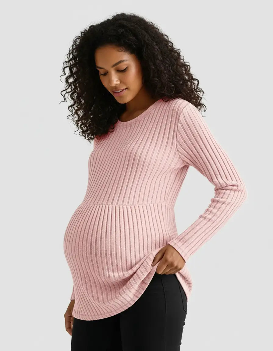 Pregnant woman in a pink stretch-ribbed casual-fit maternity top, designed for comfort.