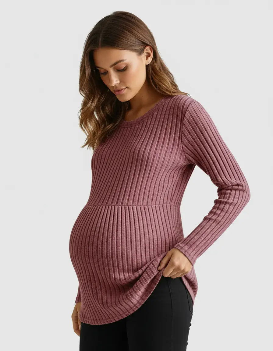 Pregnant woman wearing a dusty rose stretch-ribbed casual-fit maternity top with long sleeves.
