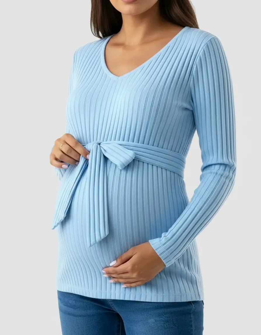 Light blue ribbed maternity top with V-neck, long sleeves, and a self-tie waist, worn by a pregnant woman.