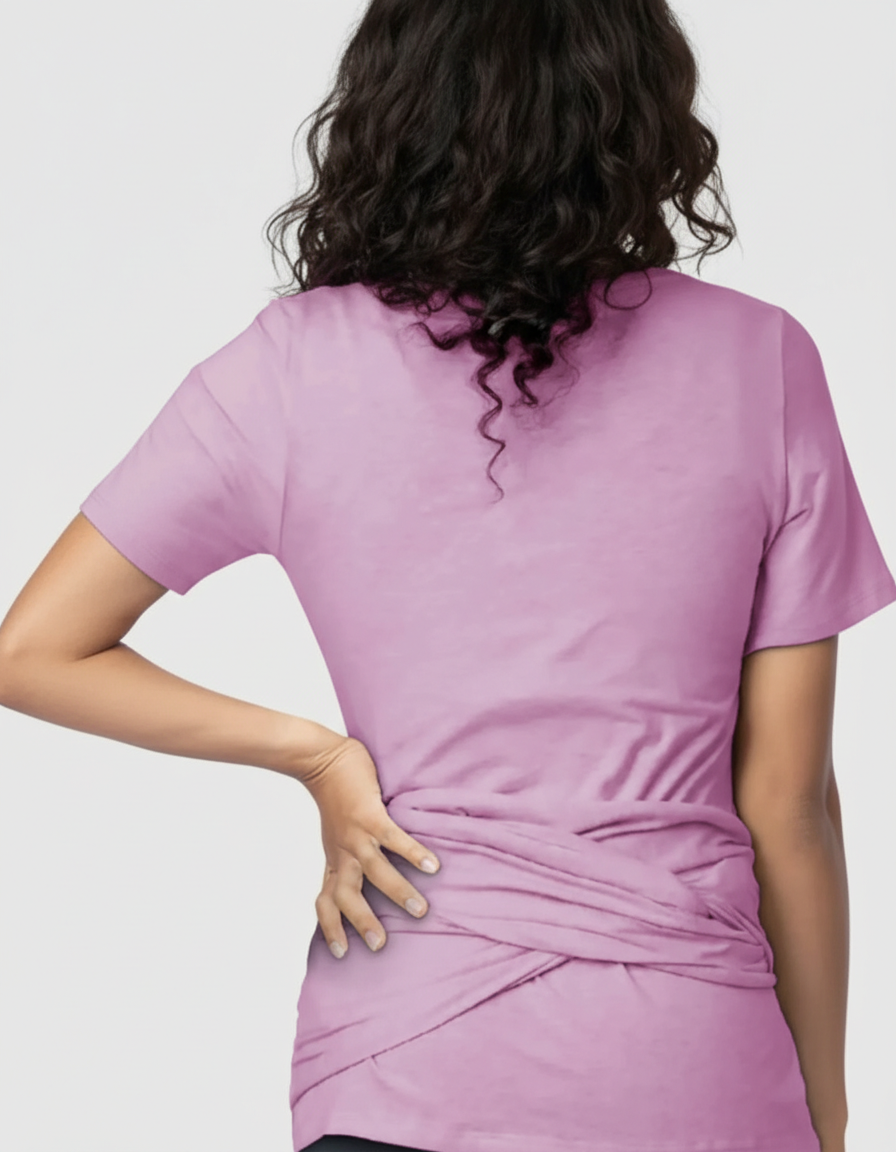 Back view of a woman wearing a soft, light purple 3-in-1 nursing wrap top with a relaxed fit.