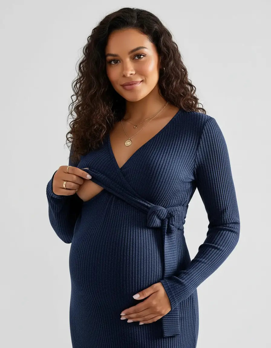 Pregnant woman in a navy ribbed knit wrap midi dress, demonstrating easy nursing access.