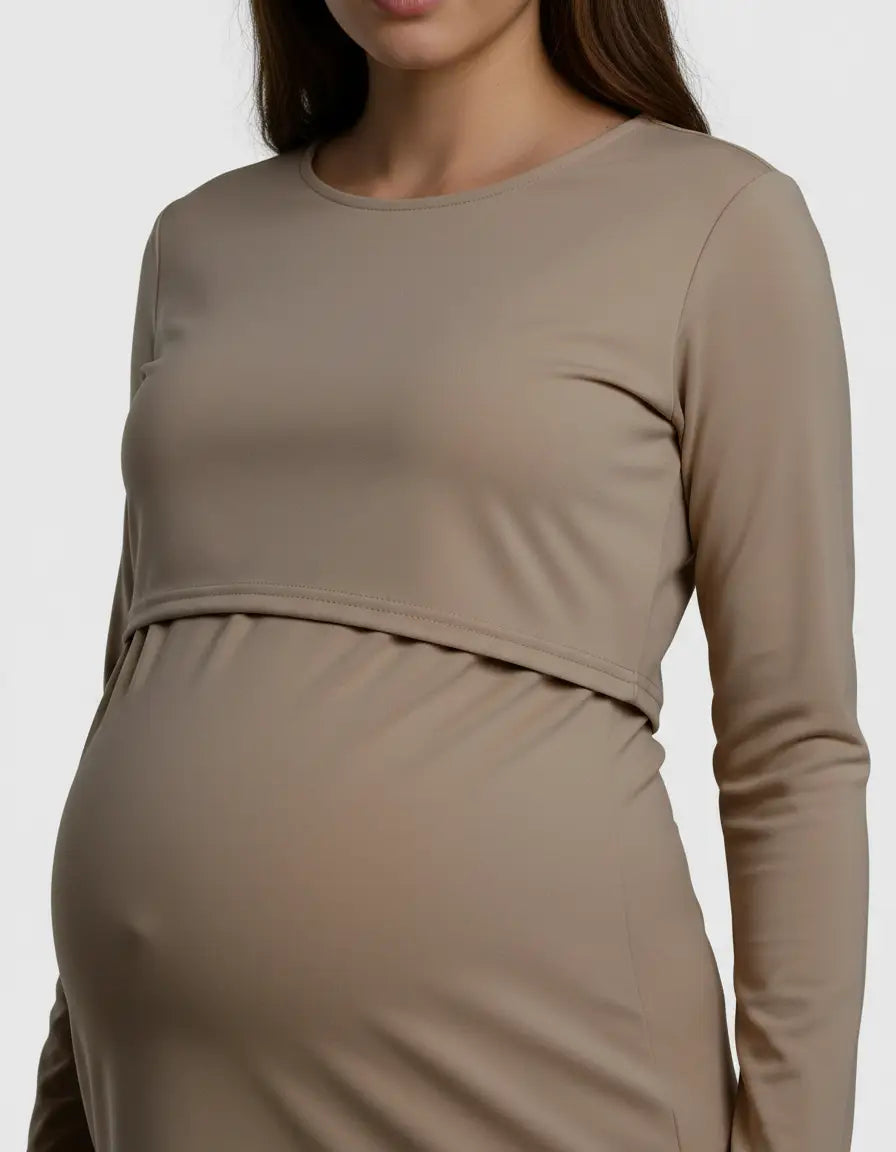 Beige long-sleeve round neck nursing top with feeding port, designed for maternity and postpartum comfort.