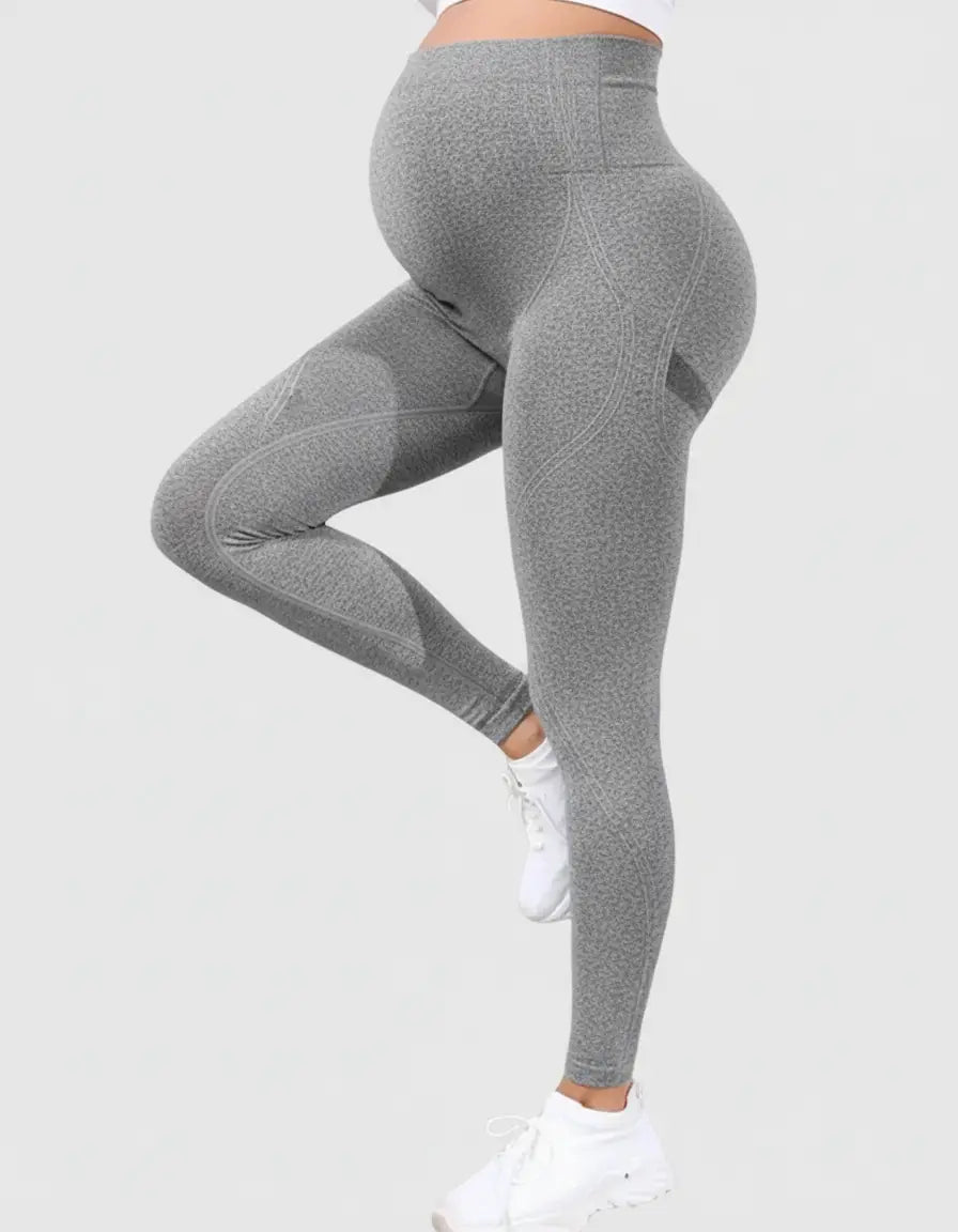 Gray belly-support sculpting maternity activewear leggings with subtle textured fabric and contouring details.